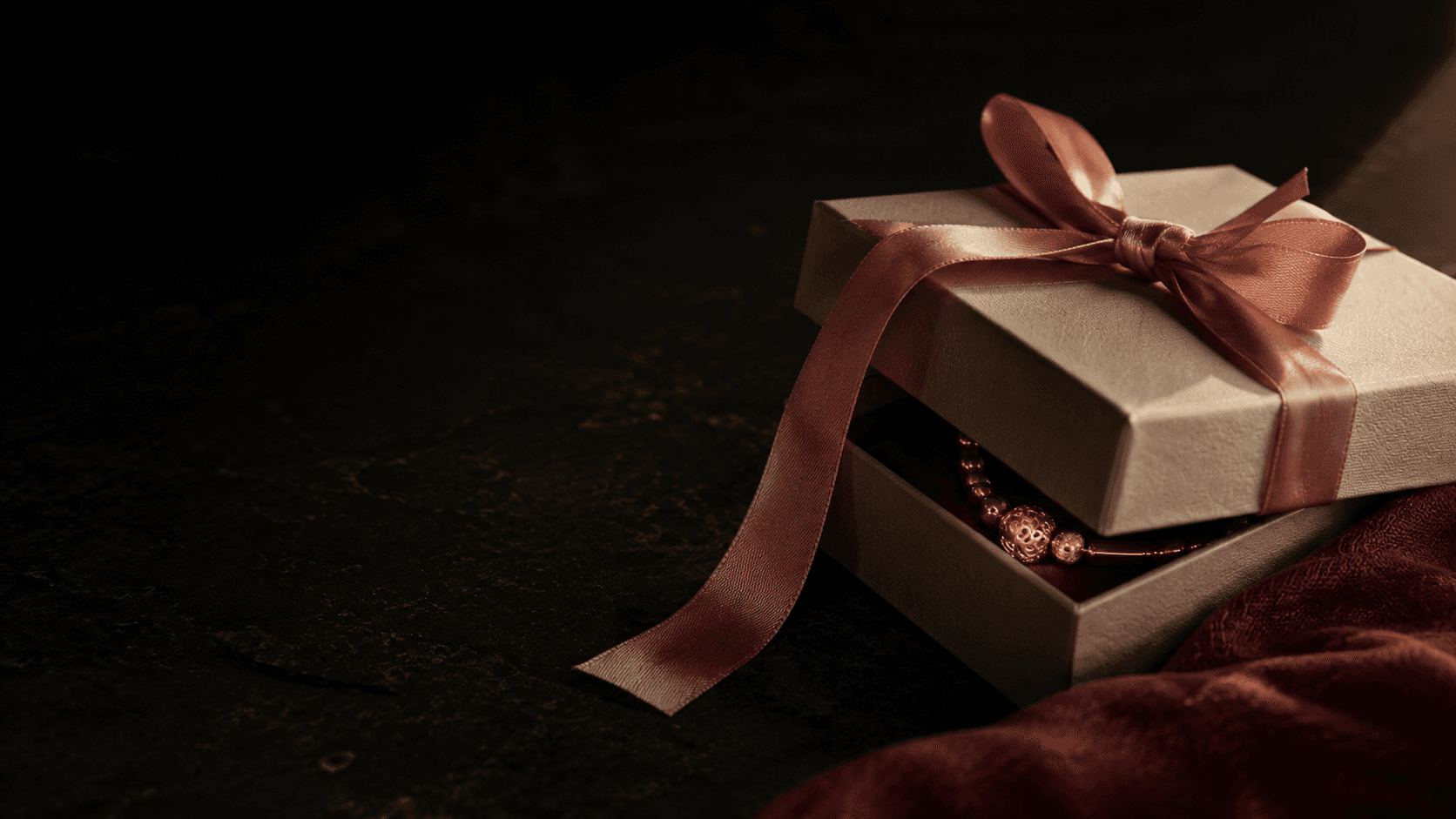 A beautifully packaged box, partially open